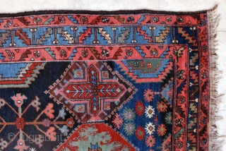 Bakhtiari rug from the village of Harchegan. 140 x 216 cm. Circa 1920-30. All natural colours. Wool weft. Spot of lpw pile. Original upper end, secured lower end.     