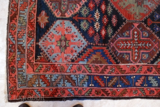 Bakhtiari rug from the village of Harchegan. 140 x 216 cm. Circa 1920-30. All natural colours. Wool weft. Spot of lpw pile. Original upper end, secured lower end.     