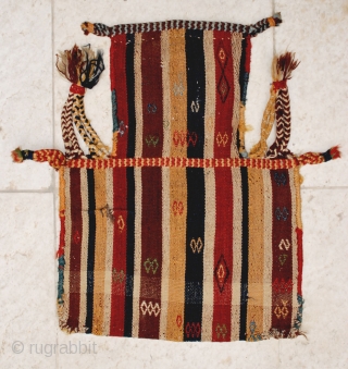 Antique jajim-woven Qashqai namakdan  (salt-bag), late 19th c. 44 x 58 cm. Some weft float brocadeed motifs on warp-faced ground. Excellent natural colors. Slight tear in the centerleft of one face  ...