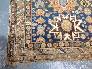 Antique lesghi star design shirvan carpet, 253x166cm, country house find, showing some dye erosion and repairs.                 