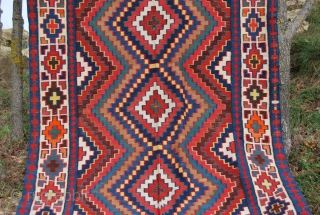 Caucasian kilim. Cm 200x320. Late 19th/early 20th century. Wonderful colors. The orange is either a fantastic natural dye, as I think or non natural as somebody questioned. Some minor corrosion on brown.  ...