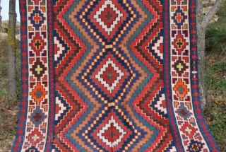 Caucasian kilim. Cm 200x320. Late 19th/early 20th century. Wonderful colors. The orange is either a fantastic natural dye, as I think or non natural as somebody questioned. Some minor corrosion on brown.  ...