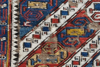Tat nomads, Caucasian Dragon Sumakh Mafrash side panel fragment. Baku region, Azerbaijian. Cm 50x100 or 20"x40" ca. Roughly mid 19th century. The red and blue diagonal stripes contain Dragon symbols stylised in  ...