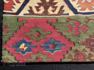 Simply a beautiful cushion......or Yastik in Turkish!
Anatolian kilim fragment mounted on black canvas with zipper.
Antique, natural saturated colors, lovely pattern with stars.
Size is cm 58x61. 
Approx date is end of the 19th  ...