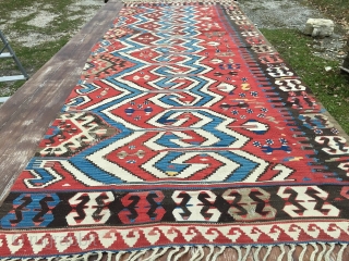 Powerful Western Anatolia Aydinli kilim strip. Cm 100x265 ca. End 19th century. Great ram horn pattern, glorious natural saturated colors. Condition: some minor oxidation, two tiny stains.      