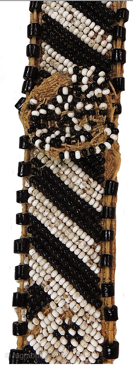 AFRICA!
Kuba people beaded headband - Congo. Mid 20th century or earlier. Cm 73x3 ca. Raffia, cowry shells, beads. Such headbands were worn by nobles of Kuba royal families. They were the sign  ...