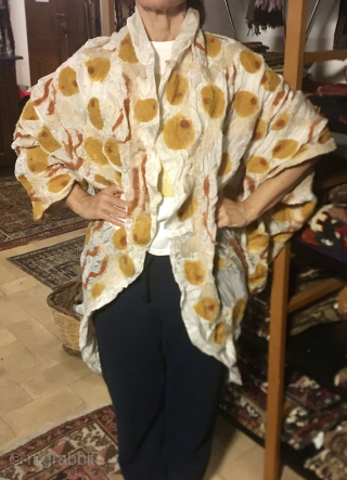 Chintamani felt on silk Sultan robe. Pattern with repeating tiger stripe and Chintamani. 
If interested please send a message here: carlokocman@gmail.com            