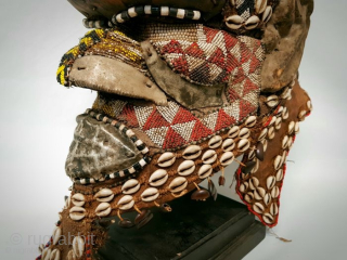Royal Kuba Elephant Mask Congo. 
Size is cm 34 h, 36 w and 23 deep. 
Weight is a bit over Kg 2. Datable 1940/1950. Wood, cowry shells, copper, iron, fabric, beads. Actually  ...