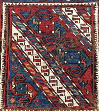 Azerbaijan. 3 Dragons in a whirl of snow and carnations. Khyzy village, north of Baku. Sumack khorjin bag face. Cm 41x43. Second half 19th century. Deep natural saturated colors. A rare, great  ...