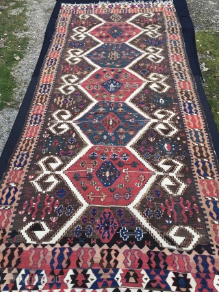 Unusual, rare, beautiful, one piece Western Anatolia, Aydin Cine kilim. Cm 145x340 ca. End 19th, early 20th c. Great ram horn medallions in glorious  brick madder red and fantastic petrol green.  ...