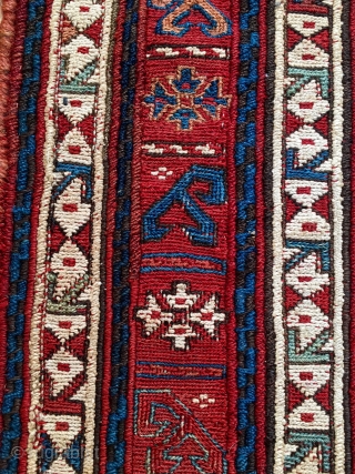 Shahsavan/Khamseh sumack saddle bag face. Cm 48x65. End 19th c. Great saturated colors. Very interesting diamond lattice main field with a repeating cruciform motif. Three, probably even more interesting borders with stylized  ...