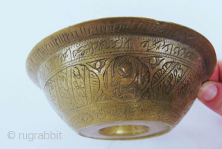 "Islamic magic cup"
"RARE ANTIQUE MUSEUM QUALITY BRASS CHIL - KHALID (RITUAL VESSEL) FROM BUKHARA AREA UZBEKHISTAN. THE VESSEL IS COMPLETELY ENGRAVED WITH BEAUTIFUL KUFIC CALLIGRAPHY FROM THE HOLY QURAN." 
This was the  ...