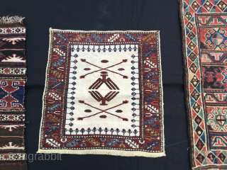 What is this?......asked a friend collector. 
Frankly would not know exactly. 
Is it heraldic? Iconic? a message? 
Imho it's from Azerbaijan, north of Baku, Shirwan area, Khyzy most probably. 
Let's stick to  ...