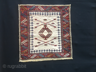 What is this?......asked a friend collector. 
Frankly would not know exactly. 
Is it heraldic? Iconic? a message? 
Imho it's from Azerbaijan, north of Baku, Shirwan area, Khyzy most probably. 
Let's stick to  ...