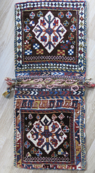 Qashqai collectors' wonder. 
This is imho a very rare and beautiful Qashqai Gabbeh khorjin. 
Cm 50x125 ca. Datable back to the 4th quarter of the 19th century.
The rarity is first of all  ...