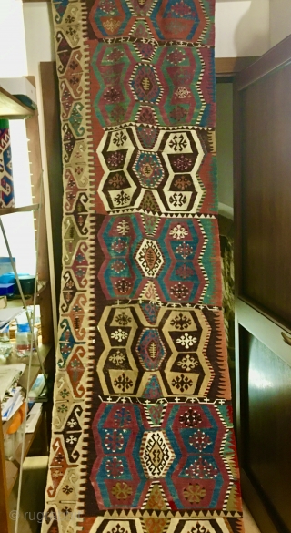 No, not simply another kilim strip! This is a special one, with incredible natural deeply saturated colors, a very interesting pattern, ....cotton, color inlets here and there...get a good look at it.....  ...