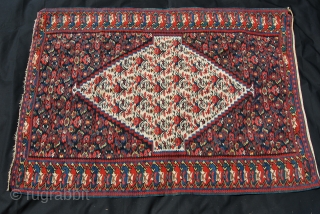 This is a great kilim. Some say it's a Bidjar, others stick to Senneh. In any way it's simply a wonderful textile example of tribal art.  
Cm 105x150. Second half 19th  ...