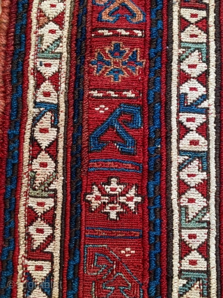 Shahsavan/Khamseh sumack saddle bag face. Cm 48x65. End 19th c. Great saturated colors. Very interesting diamond lattice main field with a repeating cruciform motif. Three main interesting borders with stylized arrow motifs,  ...