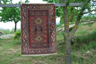 Kozak rug from Bergama area, Western Anatolia. Size is cm 97x137. Early 20th century, so, about 100 years old if not more. Low pile, one old, clearly visible restoration. Interesting pattern, great  ...