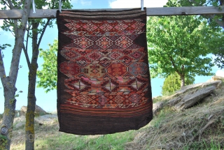 Mut cuval. Cm 90x120 ca. 1920/1930ies. Sumakh weave in front and plain goat hair weave at the back. 4,5 holes covered with patches. See more pics on fb:  https://www.facebook.com/media/set/?set=a.10151687447634258.1073741855.358259864257&type=3
   