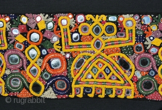 Rabari nomads shawl end from North-Western India. Heavily embroidered with lots of small mirrors to ward off evil eye. Cm 15x92, framed cm 25x100. A lovely decorative tribal jewel.
See more pics on  ...