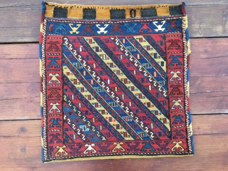 Shahsavan sumack khorjin bag with original back. Cm 60x60 ca. End 19th century. Great colors, great weaving details. A very beautiful bag, with a rough, primitive weave and crisp colours. In very  ...