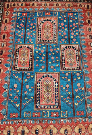 ANTIQUE GORGEOUS POMEGRANATE TREE OF LIFE SHIRWAN RUG WITH PALMETTES ON MADDER RED SIDE FIELD

CM 148X174
AGE: MID 19TH CENTURY, SHOULD BE 1860/70 SH
A very rare Shirwan rug with pomegranate trees of life  ...