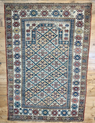 Shirwan prayer rug.
A small tribal jewel just out an important collection. Size is cm 95x150.
Approx age is 4th q of the 19th c.
White background. The area around the mihrab is filled with  ...