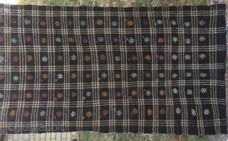 Goat hair kilim. Cm 113x243. Early to mid 20th century. Eastern Anatolia. Black & white checkered pattern with over hundred embroidered "guls". See description in here: http://rugrabbit.com/node/167998
      