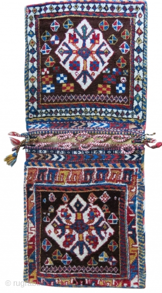 Qashqai collectors item. This is imho a very rare and beautiful Qashqai Gabbeh pattern type khorjin/saddle bag. Cm 50x125 ca. Datable back to 100/110 years. The rarity is first of all in  ...