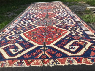 Aydin Cine kilim. Size is cm 150x360 ca. Second half 19th century. Professionally mounted on black linen. Gorgeous colors. Fantastic deep madder red, great cochineal pink, indigo blue, light yellow,, etc. Very  ...