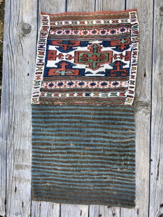 Small but great Shahsavan sumack bag. Unusual, asymmetric, very fine, antique. Never seen something like this. Cm 33x65, open is 36x68. Lovely graphics, great colors, white is cotton. Rare pattern. I especially  ...