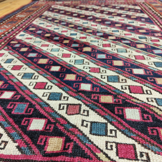 Diagonal stripe small, sweet rug most probably a Ghendje, but could well be from the village of Khyzy in northern Azerbaijan or even a Mogan. Great colors. Lovely pattern. Sale on behalf  ...