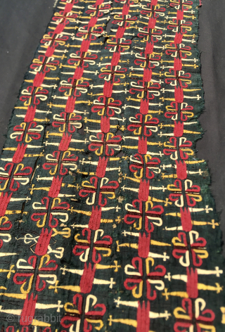Tekke silk black chapan fragment.
Cm 36x90
Datable 3rd/4th q 19th century
Condition issues: holes and tears
Silk on silk
Background is black, embroidery red, yellow, orange
Great embroidered workmanship.
Email carlokocman@gmail.com

        