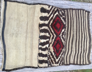 Grain bag by the Bakhtiari/Lori tribal group from Western Iran
Cm 112x152 - 1st q 20th century
This is an open TACHEH, also called grain bag, woven by the Bakhtiari/Lori.
Flaweave and pile weaving.
It's original,  ...