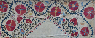 Extremely beautiful Suzani Kapunuk. 
Cm 142x216. 
Late 19th or early 20th century. 
Silk on cotton. 
Wonderful natural colors. 
Great workmanship. 
In good condition. 
Some black stitches are oxidized as you can see  ...