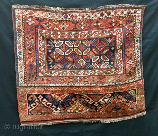 Watch the Dragons in the cage! 
Lori/Bakhtiari imho, but it could well be Qashqai.......or? 
Sumack & pile weaving.
Size is cm 88x102 
Interesting pattern with dragons in the central field, or? 
Is it  ...