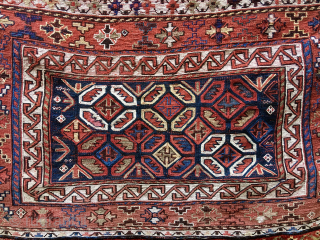 Watch the Dragons in the cage! 
Lori/Bakhtiari imho, but it could well be Qashqai.......or? 
Sumack & pile weaving.
Size is cm 88x102 
Interesting pattern with dragons in the central field, or? 
Is it  ...