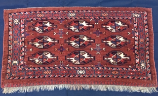 Turkmen Yomut cuval with great insect border. Cm 60x112. Late 19th century. Natural dyes. 9 gul pattern. Very precise drawing. In good condition. One restoration left corner below. Really beautifull, elegant, collectable. 