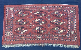 Turkmen Yomut cuval with great insect border. Cm 60x112. Late 19th century. Natural dyes. 9 gul pattern. Very precise drawing. In good condition. One restoration left corner below. Really beautifull, elegant, collectable. 