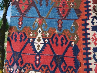 Antique Malatya kilim strip. Size is cm 75x395 or 2'8"x11'2" ca. Age is first quarter 19th century. Colors are simply wonderful: indigo, green, madder, cochineal, aubergine, etc....all fantastic. Some brown must have  ...