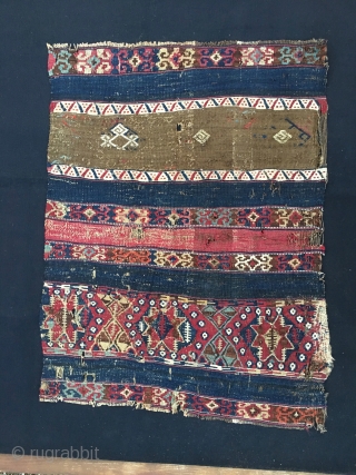 Reshwani/Sinanli kilim fragment. Cm 70x90. Datable 1840/1860. Amazing textile with lots of cochineal, indigo and metal thread. Worn, torn, battered, but still glowing with lots of character, aura, power. Great colors.
  