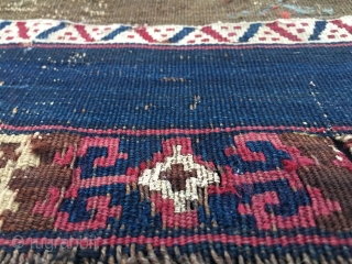 Reshwani/Sinanli kilim fragment. Cm 70x90. Datable 1840/1860. Amazing textile with lots of cochineal, indigo and metal thread. Worn, torn, battered, but still glowing with lots of character, aura, power. Great colors.
  