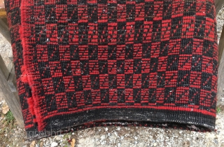 Red & Black chequered Karapinar yatak or sleeping rug. Central Anatolia, Turkey. Size is cm 140x355 ca. Datable to the 1920sh. Warp is cotton, weft and pile are in hand spun thick  ...