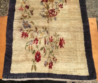 Flower vintage yatak or sleeping rug. Cm 140x240 ca. Datable 1920/1940. Central Anatolia, could be Karapinar. Very high pile. Beige field with blueish border. Condition issues: a couple of small moth holes  ...