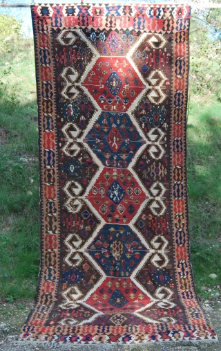 Western Anatolia, Aydin Cine kilim. Cm 145x340 ca. End 19th, early 20th c. Great ram horn medallions in glorious madder red and fantastic green. Oxidized brown here and there. More pics on  ...