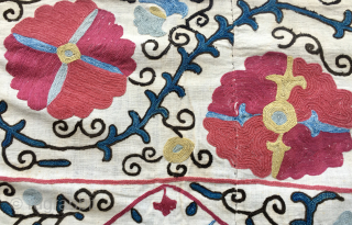 Extremely beautiful Suzani Kapunuk or wall/door hanging. 
Cm 142x216. 
Late 19th century, or even earlier. 
Pure natural silk on cotton. 
Wonderful natural colors. Plenty of indigo and madder nuances.
Great workmanship.  
Some  ...