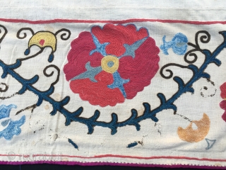 Suzani Kapunuk. 
Cm 142x216. 
Late 19th or early 20th century. 
Silk on cotton. 
Wonderful natural colors. 
Great workmanship. 
In good condition. 
Some black stitches are oxidized as you can see from the  ...