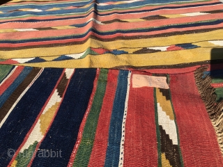 Caucasian Kazak kilim. Antique, very very thin, with great natural saturated colors. In good condition. Condition issues: some old restoration and a couple of stains. A supper flat weave.    