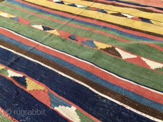 Caucasian Kazak kilim. Antique, very very thin, with great natural saturated colors. In good condition. Condition issues: some old restoration and a couple of stains. A supper flat weave.    